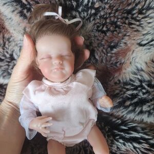 COPY - Realistic reborn baby doll dressed in pink